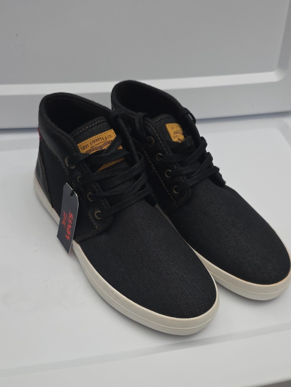 Levi's Black Canvas Mid-Top Sneakers with White Sole